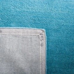 Mandy Solid Tufted Rug - Safavieh -Safavieh GUEST 21f4f61a 8789 415a ac3b 806e4c8e405e