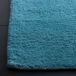 Mandy Solid Tufted Rug - Safavieh -Safavieh GUEST 6aaa359f 2ec0 4b95 88c4 e00b421882ac