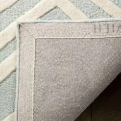 Safavieh Kids SFK910 Hand Tufted Area Rug - Safavieh -Safavieh GUEST f320feed 6e60 4952 96ce bfe3189f733d